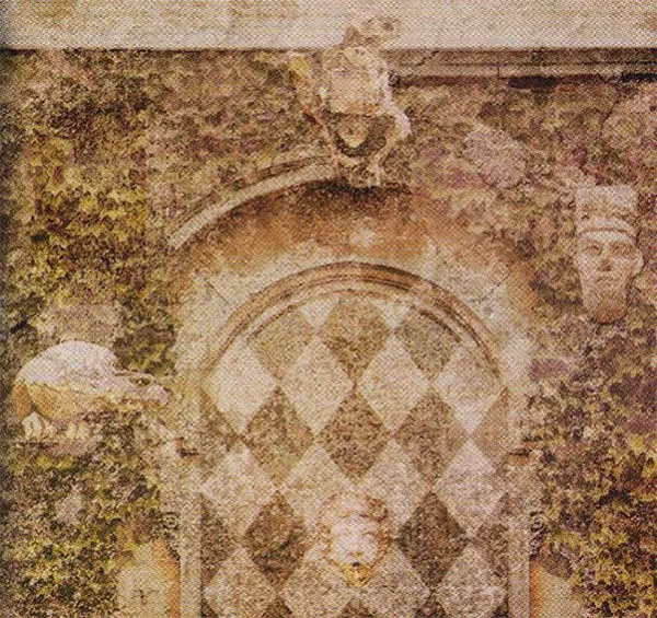 Tượng hình Khuôn mặt người kiêm vòi nước trong lá bài The Wheel Of Fortune Tyldwick Tarot - Vòng Quay Số Phận trong Tyldwick Tarot