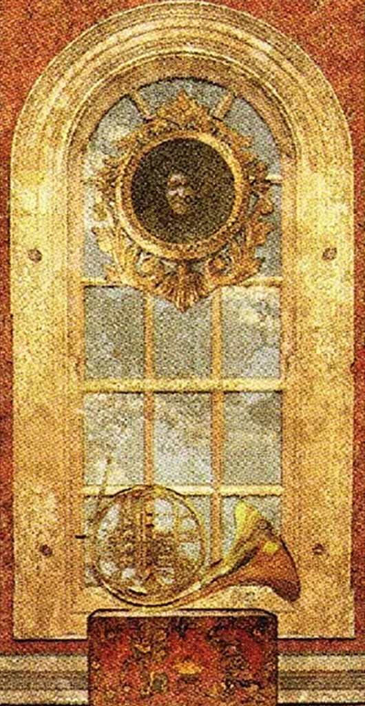 Ô cửa sổ và chiếc kèn cor trong lá bài King Of Staves Tyldwick Tarot - Vua Gậy trong Tyldwick Tarot